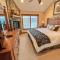 Lakefront home with fire pit and dock Near Wisp Resort