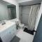 bedroom with sharing bathroom