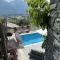 Ferienhaus Patrizia with a fantastic view of Lake Maggiore and the pool