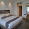 Hotel Razmoni Isha Kha International
