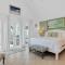 Waterfront luxury Villa 21 with sunset views and boat slip
