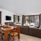 Elevation 2 bedroom plus study with gas fire and spectacular views