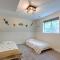 Serene Pentwater Getaway with Yard Near Lakes