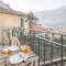 Pozzo Vertical Apartment with garden and parking by Rent All Como