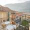 Pozzo Vertical Apartment with garden and parking by Rent All Como