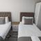 Cocoon @ International Inn + Apartments