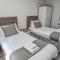 Cocoon @ International Inn + Apartments