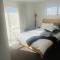 Lakes Executive Suites - 陶朗加