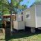 Envie d un break de paysages sauvages et de nature ce mobile home neuf tout confort climatise idealement situe au bord de l eau dans un camping 4 etoiles vous attend pour un week end quelques jours ou des vacances en famille - Cap-Ferret