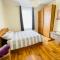 Entire 4 bedroom House - EV POINT & FREE PARKING