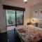 The Good Life - Two Bedroom Garden Apartment
