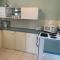 Upstairs Beachfront Unit in Central Location
