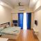 Top Luxuries Couple Friendly Stay in Gaur Mall by Taj Studios near to #Expo Centre #CPHI & P-MEC