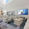 Luxurious Waterfront North Facing 5 bedroom House with pool, pontoon and Deep Water Access near Mooloolaba