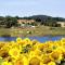 Surrounded by the beautiful sloping Tuscan landscape