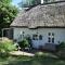 Zauberhaftes englisches Cottage am Gutshaus Zauberhaftes englisches Cottage am Gutshaus