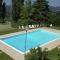 Apartment in a farmhouse with swimming pool