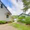 Waterfront Gray Home with Furnished Deck and Fire Pit!