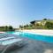 Apartment on Lake Garda with pebble beach pier for boat three swimming pools