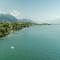 Apartment on Lake Garda with pebble beach pier for boat three swimming pools