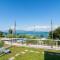 Apartment on Lake Garda with pebble beach pier for boat three swimming pools