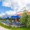 Apartment on Lake Garda with pebble beach pier for boat three swimming pools