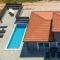 Apartment Flego with private swimming pool and big outside space