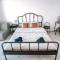 Peniche master bedroom with sea view balcony, private bathroom, shared kitchen, swimming pool, surfing resort