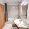 Peniche master bedroom with sea view balcony, private bathroom, shared kitchen, swimming pool, surfing resort