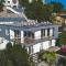 Beachfront Villa Grace with heated rooftop pool