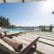Beachfront Villa Grace with heated rooftop pool