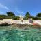 Luxury Seaside Villa with a classic Mediterranean Olive Garden, a fully equipped Professional Kitchen, Pool, Sauna, Padle Boards and Canoe - Miolin Beach House