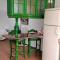 Habitación matrimonial en un bajo baño compartido Areas compartidas
