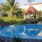 Spacious house with shared pool in Palmar, sea view.