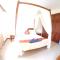 Spacious house with shared pool in Palmar, sea view.