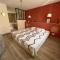 Suite romantique bohème chic avec bain à remous