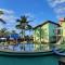 Flat Taperapuã Praia Village - Bahia