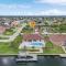 Gulf Access, Heated Pool, Sleeps 6 - Villa Peaceful Palms - Roelens Vacations - Cape Coral