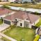 Pool, Patio and Yard Chic South Texas Home