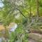 Riverfront Ellijay Cabin with Deck and Pool Access!