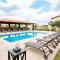 4BR Oasis with Pool & Gym at Nueva Escondida