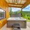 Modern Lakeside Cabin with Mountain Views and Hot Tub!