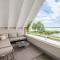 Wellness-Apartment mit Wasserblick, Pool, Sauna & Fitnessbereich