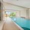 Bild Wellness-Apartment mit Wasserblick, Pool, Sauna & Fitnessbereich