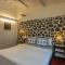 SaffronStays Artica - Rustic twin cottages with verandahs & gardens offering a rural Lonavala experience