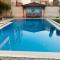 Lovely Villa 5- bedroom with Overflow Pool with Nice Garden at Green Oasis Resort - Aleksandria