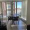 1BD+Den condo, with free parking in Downtown!