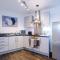 2 Bed apartment with balcony private parking near Etihad Stadium, COOP Live