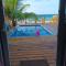 Villa Devonia - Beachfront Cabins with Pool at Tela, HN