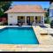 CASA 7 qts sendo 4 suites, Piscina Churrasqueira 200 m praia Anjos